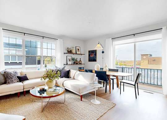 Living Room With Balcony at Field and Grove Townhomes of Champlin, Champlin, 55316