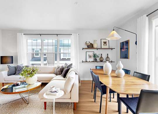 Dining Area With Living at Field and Grove Townhomes of Champlin, Minnesota