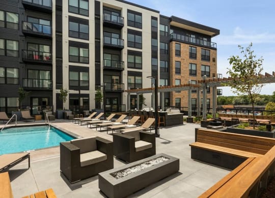 Relaxing Pool Area With Sundeck at Residences at 1700, Minnetonka