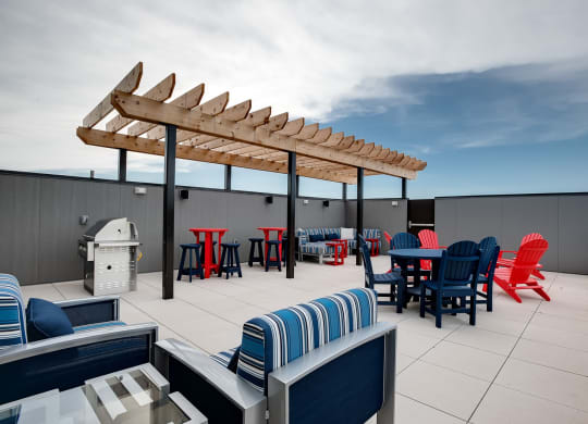 rooftop outdoor patio with firepit, grills and seating at Lake Jonathan Flats, Chaska, MN, 55318