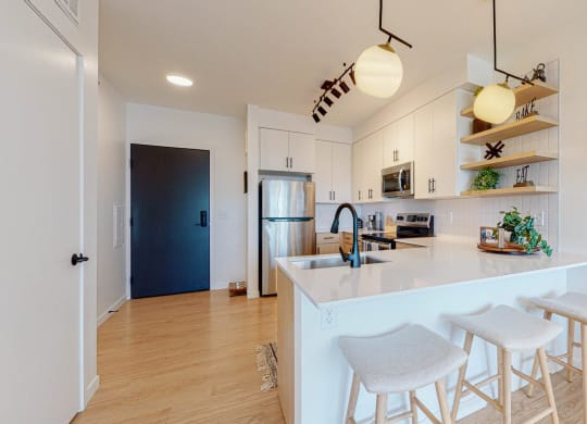 Kitchen with counter table at CityLine Apartments, Minneapolis, MN