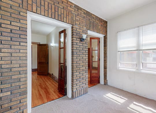 Sibley_3br_porch with exposed brick