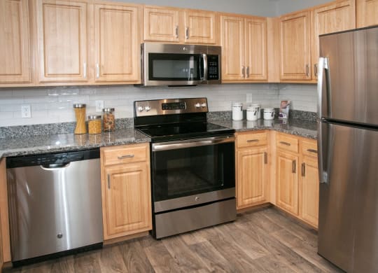 Granite countertops, backsplash, stainless steel appliances!