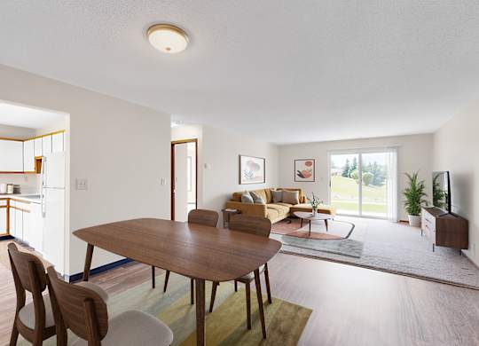 A dining room with a table and chairs is shown.