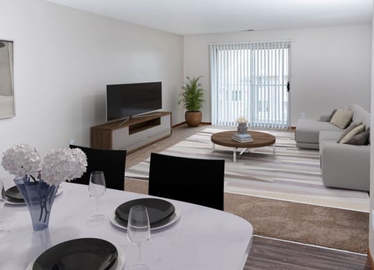 a living room with white walls and a white dining table with black chairs