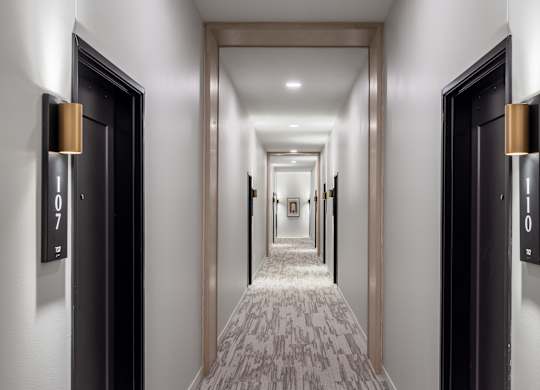 A hallway with doors 7 and 11.