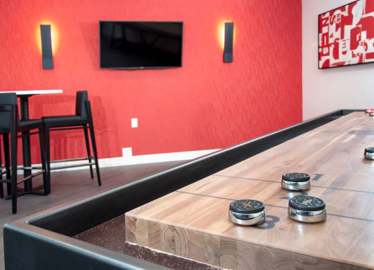 shuffleboard table and gaming at Eagan Place Apartments, Eagan, MN