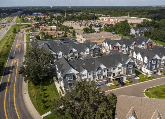 an aerial view of townhouses in a suburban neighborhood