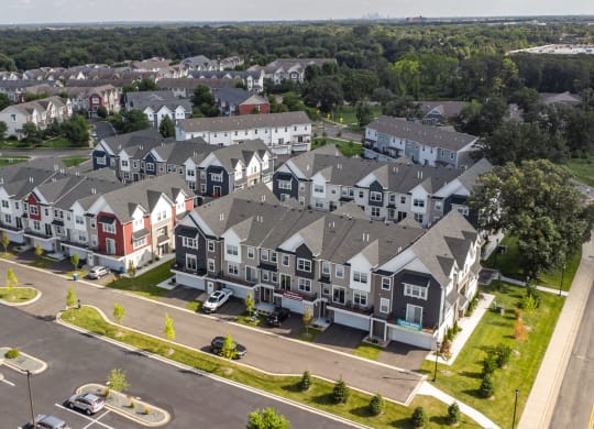 an aerial view of an apartment complex in a suburb