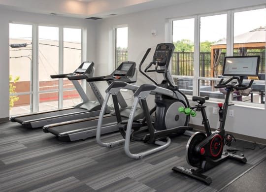 fitness room cardio machines at Urban Park I and II Apartments, St Louis Park