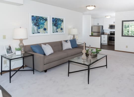 a living room with a couch and a coffee table