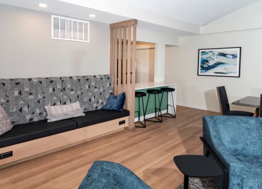 a living room with a couch and a table