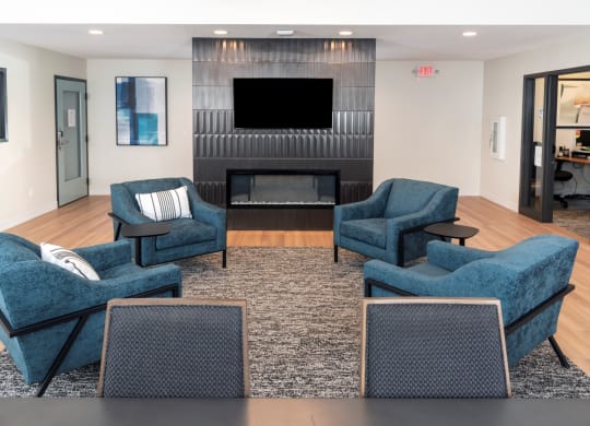 a living room filled with furniture and a fire place