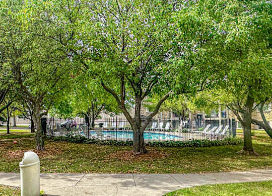 A park with a pool and a bicycle.