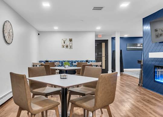 Community Room With Firepit at Hillsborough Apartments, Roseville, 55113