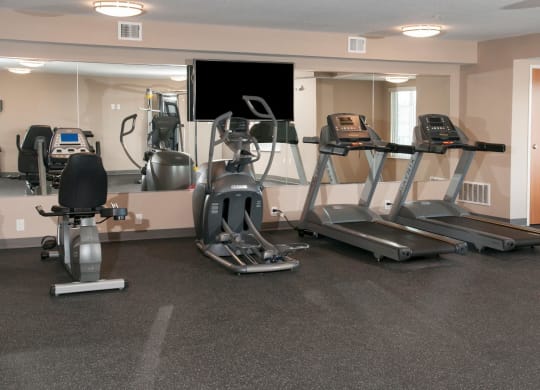 Carver Crossing Fitness Room with Bike, Elliptical and Treadmill Machines