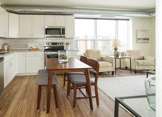 Refrigerator And Kitchen Appliances at The Bessemer at Seward Commons Apartments, Minneapolis