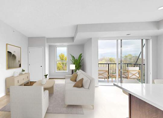 A modern living room with a white sofa set and a wooden floor.