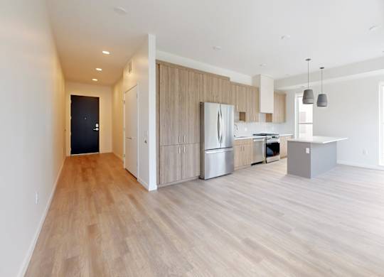 wooden floors and modern appliances at One West Drive Apartments, Minnesota, 55331