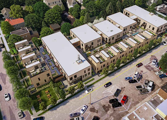 an aerial view of buildings and cars in a parking lot at One West Drive Apartments, Excelsior, 55331