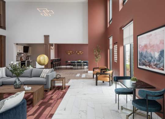 A modern living room with a grey sofa, a wooden coffee table, and a large painting on the wall.at The Edison at Maple Grove, Maple Grove Minnesota