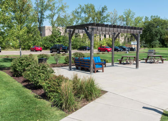 Outdoor Grill With Intimate Seating Area at Shoreview Grand with BBQ grills.