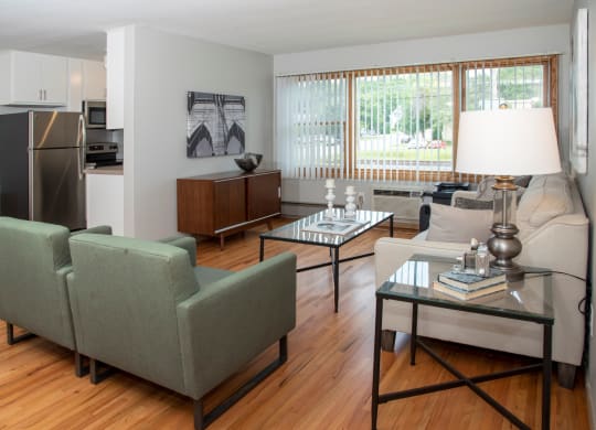 large windows, refinished hardwood floors