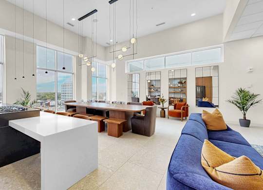 A modern living room with a view of the city.