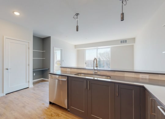 a kitchen with a sink at The Exchange Apartments, Minnesota, 55112