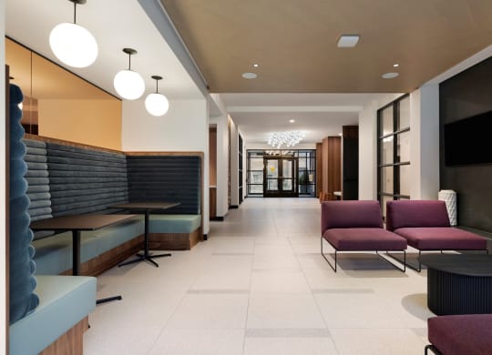 Inviting Lobby Area with Plenty of Seating at The Hill Apartments in St Paul, MN