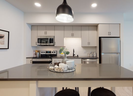 Gourmet Kitchen With Island at The Hill Apartments, Saint Paul