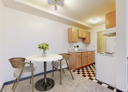 a kitchen and dining area in a 555 waverly unit
