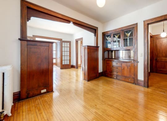 Stunning Layout with Accenting Wood Trim and Natural Restored Hardwood Flooring at The Park Apartments in Minneapolis