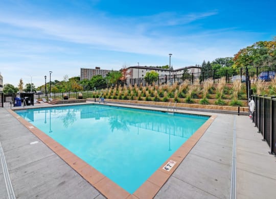 the swimming pool at the enclave at city center apartments