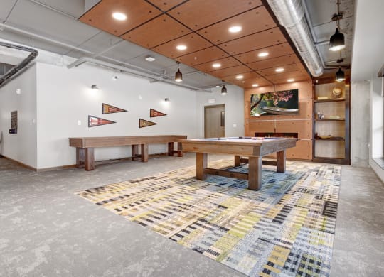 a game room with two pool tables and a foosball table at The Yards and Backyards, Minnesota, 55075
