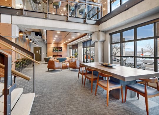 a large open room with a large table and chairs at The Yards and Backyards, Minnesota