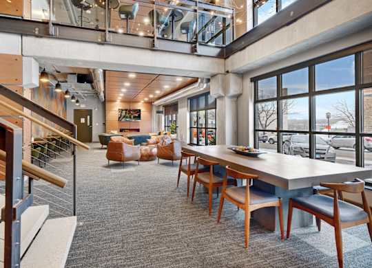 a large open room with a large table and chairs