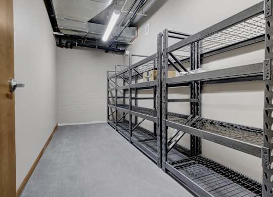 a room with storage shelving in it