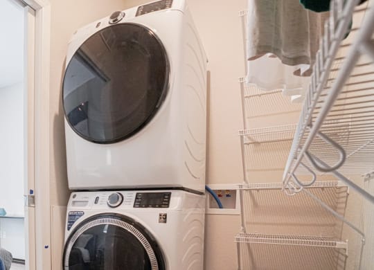 a washer and dryer in a laundry room at The Yards and Backyards, Saint Paul