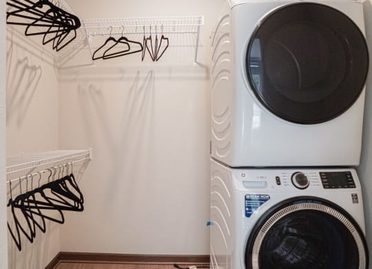 a washing machine and dryer in a laundry room at The Yards and Backyards, Minnesota, 55075