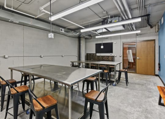 a large room with tables and chairs