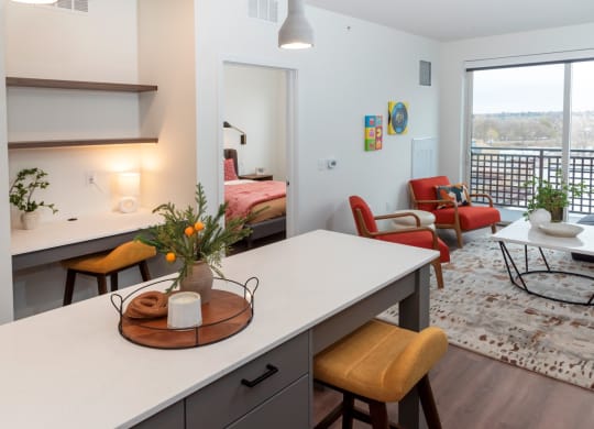 a kitchen and living room in an apartment at Tyler Street Stacks, Minnesota