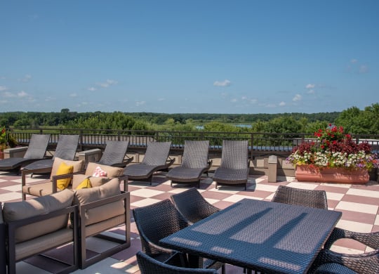 Rooftop patio with a variety of lounge seating at Victoria Flats, MN 55386