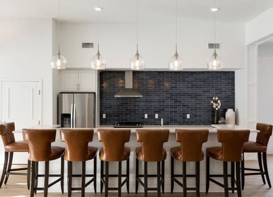 Stunning navy backsplash in clubroom kitchen at Waterstone Place in Minnetonka