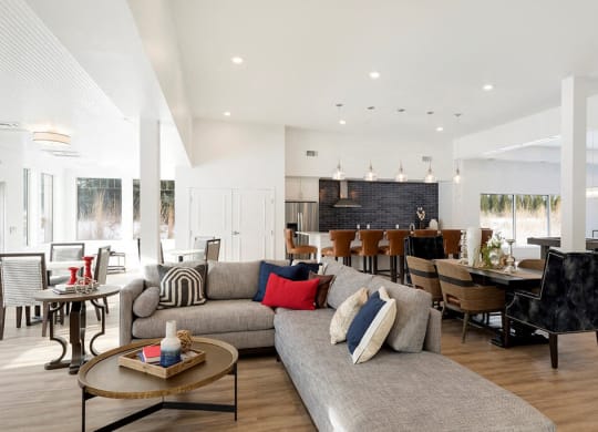 Large furnished clubroom with hardwood floors at Waterstone Place in MN 55305