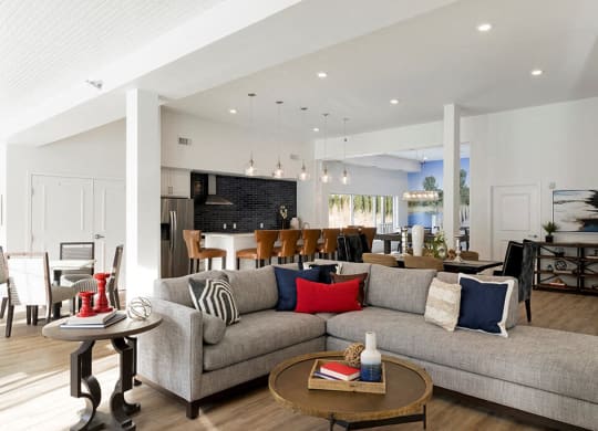 Bright clubroom with large grey sectional at Waterstone Place in Minnetonka, MN 55305