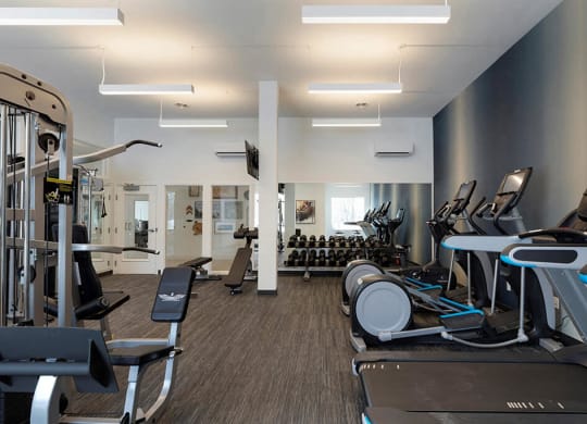 Fitness center with machines, free weights and state of the art lifting stations at Waterstone Place in Minnetonka, MN 55305