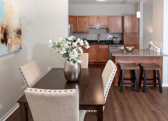 dining and kitchen with lvt