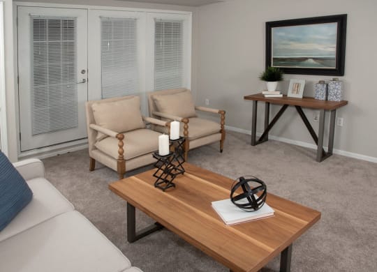 Living room with patio or balcony