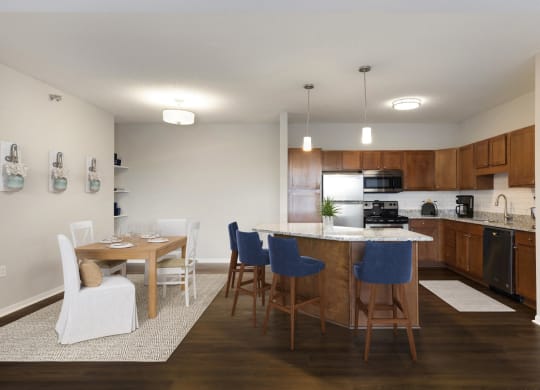 Dining Area with Kitchen View at Waterstone Place in Minnetonka